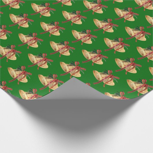 gouden kerstbellen op groen cadeaupapier (Hoek)