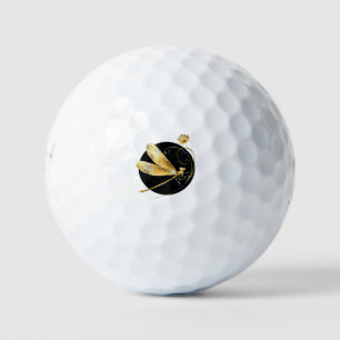 Gouden libel in zwarte cirkel golfballen