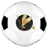 Gouden libel in zwarte cirkel voetbal (Gedraaid)