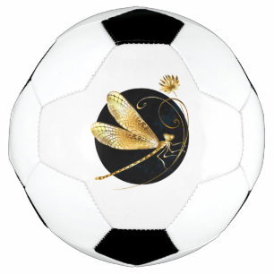 Gouden libel in zwarte cirkel voetbal