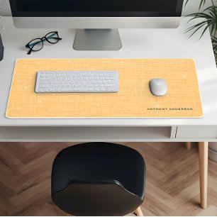 Gouden linnen textuur met subtiele witte glans bureaumat