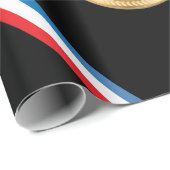 Gouden medaille-onderscheiding met rood-wit-blauw cadeaupapier (Rol Hoek)