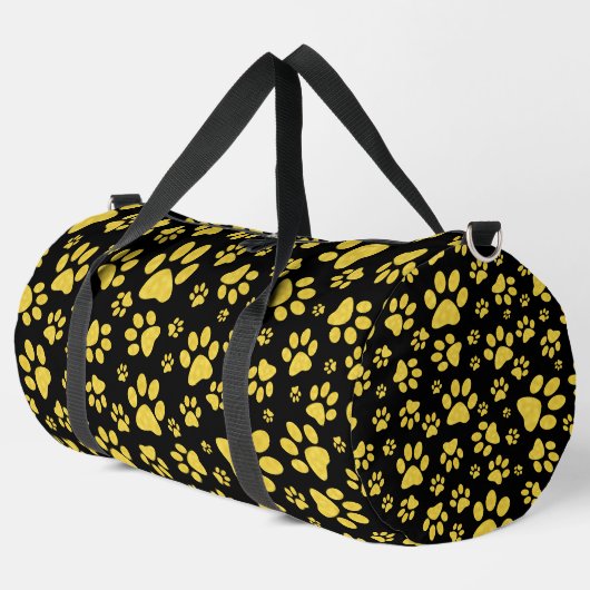 Gouden metalen patroonpoten op zwarte achtergrond plunjezak (Linkerhoek)