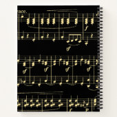 Gouden muziek op zwart notitieboek (Achterkant)