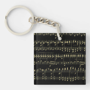 Gouden muziek op zwart sleutelhanger