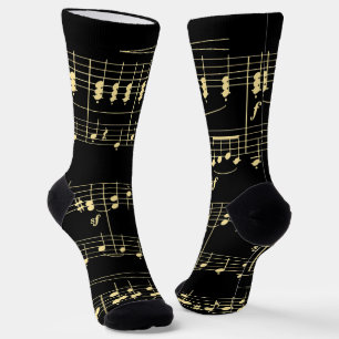 Gouden muziek op zwart sokken