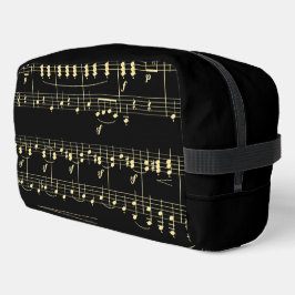 Gouden muziek op zwart toilettasje