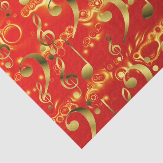 gouden muzieknoten in het rood tissuepapier (Detail)