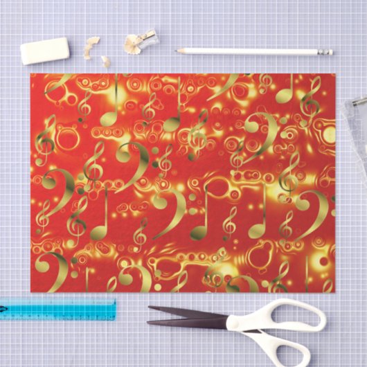 gouden muzieknoten in het rood tissuepapier (Craft)