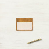 Gouden namaak ruw hout achtergrond post-it® notes (Op bureau)