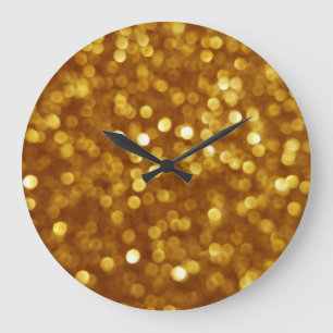 Gouden onscherpte glitter, sprankelende textuur. grote klok