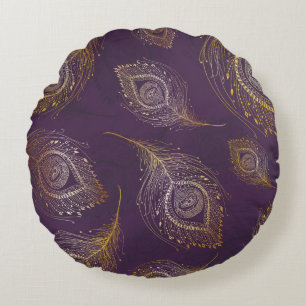 Gouden pauwenveer, violette achtergrond. rond kussen