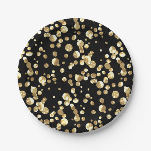 Gouden polka stippen op een zwarte achtergrond . p papieren bordje