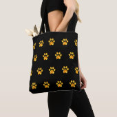 Gouden poten op zwart tote bag (Dichtbij)