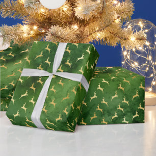 Gouden rendieren op donkergroen cadeaupapier