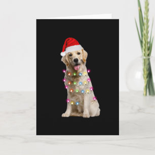 gouden retriever zittend met kerst kaart