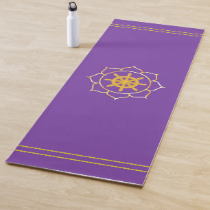 Gouden scheepswiel in lotus op paars yogamat