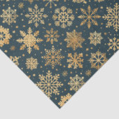 Gouden sneeuwvlokken op donkerblauw tissuepapier (Detail)