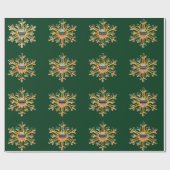 Gouden sneeuwvlokken op groen inpakpapier (Vlak)
