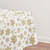 Gouden sneeuwvlokken op wit tafelkleed (Voorbeeld)