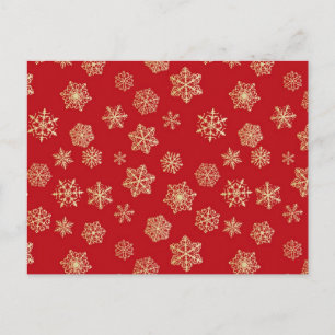 Gouden sneeuwvlokken tegen diep rood briefkaart