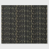 Gouden sprankelende lichten op zwart cadeaupapier (Vlak)