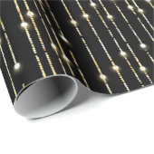 Gouden sprankelende lichten op zwart cadeaupapier (Rol Hoek)
