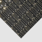 Gouden sprankelende lichten op zwart tissuepapier (Detail)