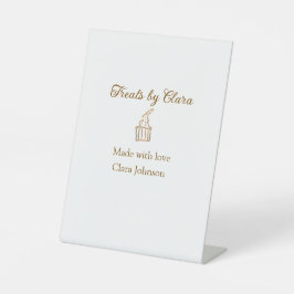 Gouden sprankelende traktaties bakkerij gemaakt me reclamebord met voetstuk