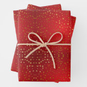 Gouden ster met rode achtergrond inpakpapier vel (In situ)