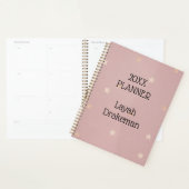 Gouden sterren op roze jaarlijks planner (Display)