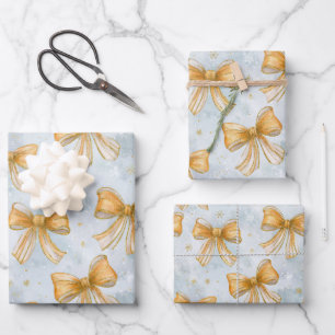 Gouden strikken babyblauw kerstfeest inpakpapier vel