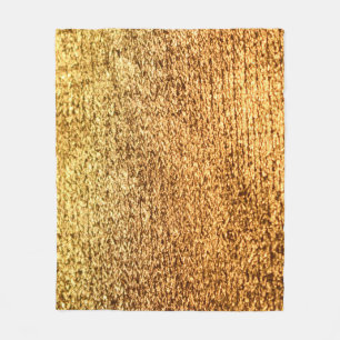 Gouden textiel: glamoureuze macro achtergrond. fleece deken