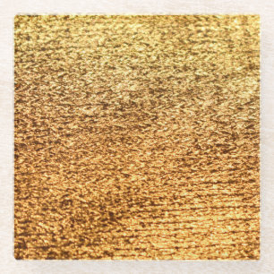 Gouden textiel: glamoureuze macro achtergrond. glazen onderzetter
