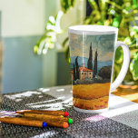 Gouden Toscane Dromen Latte Mok<br><div class="desc">Geniet van la dolce vita met deze Golden Toscane Dreams Latte-Mok, met een prachtig beschilderd landschap van Toscaanse gouden wijngaarden en met cipressen bezaaide heuvels. Geïnspireerd door impressionistisch penseelwerk, brengt deze royaal gedimensioneerde mok galerijwaardige kunst naar uw ochtendritueel. Perfect voor: Italiaanse koffie-enthousiastelingen Wijnland B & B gast voorzieningen Trouwgunsten voor...</div>
