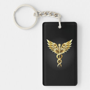 Gouden veelhoekig symbool Caduceus Sleutelhanger
