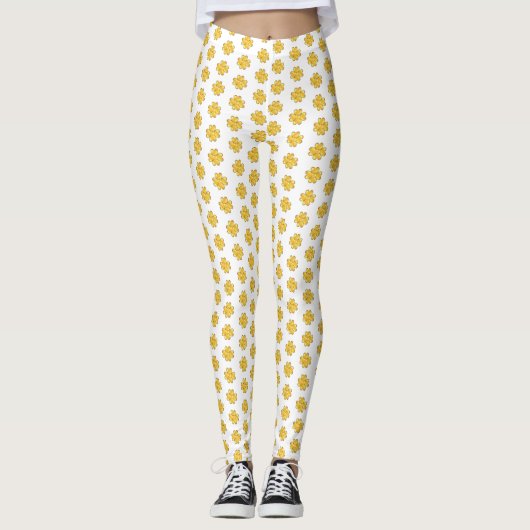 Gouden vierbladige klavers op wit leggings (Voorkant)