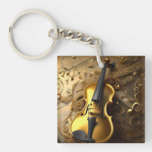 gouden viool op gouden muziekkoorden, sleutelhanger