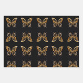 Gouden vlinder op zwarte achtergrond Inpakpapier (Voorkant)