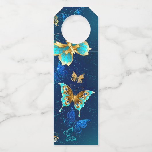 Gouden Vlinders op een Blauwe Achtergrond Flessenhanger (Voorkant)