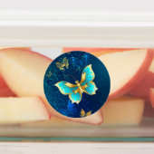 Gouden vlinders op een blauwe achtergrond labels (Aangebracht)