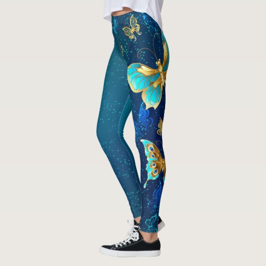 Gouden Vlinders op een Blauwe Achtergrond Leggings (Links)