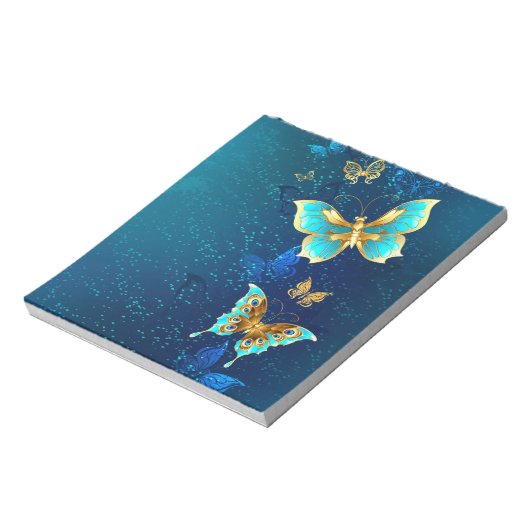 Gouden vlinders op een blauwe achtergrond notitieblok (Linkerzijde)