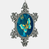 Gouden Vlinders op een Blauwe Achtergrond Tin Sneeuwvlok Ornament (Links)