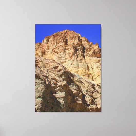 Gouden woestijnklif onder blauwe lucht canvas afdruk (Voorkant)