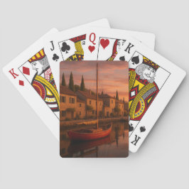 Gouden zonsondergang boven het kustdorp pokerkaarten