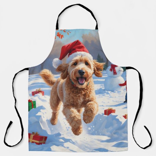 Goudendoodle rent in de sneeuw met kerstmuts schort (Voorkant)
