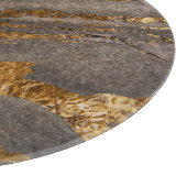 Goudgeaderde grijze marmeren getextureerde achterg snijplank (Hoek)