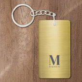 Goudgeborsteld metallic monogram sleutelhanger