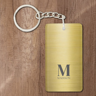 Goudgeborsteld metallic monogram sleutelhanger